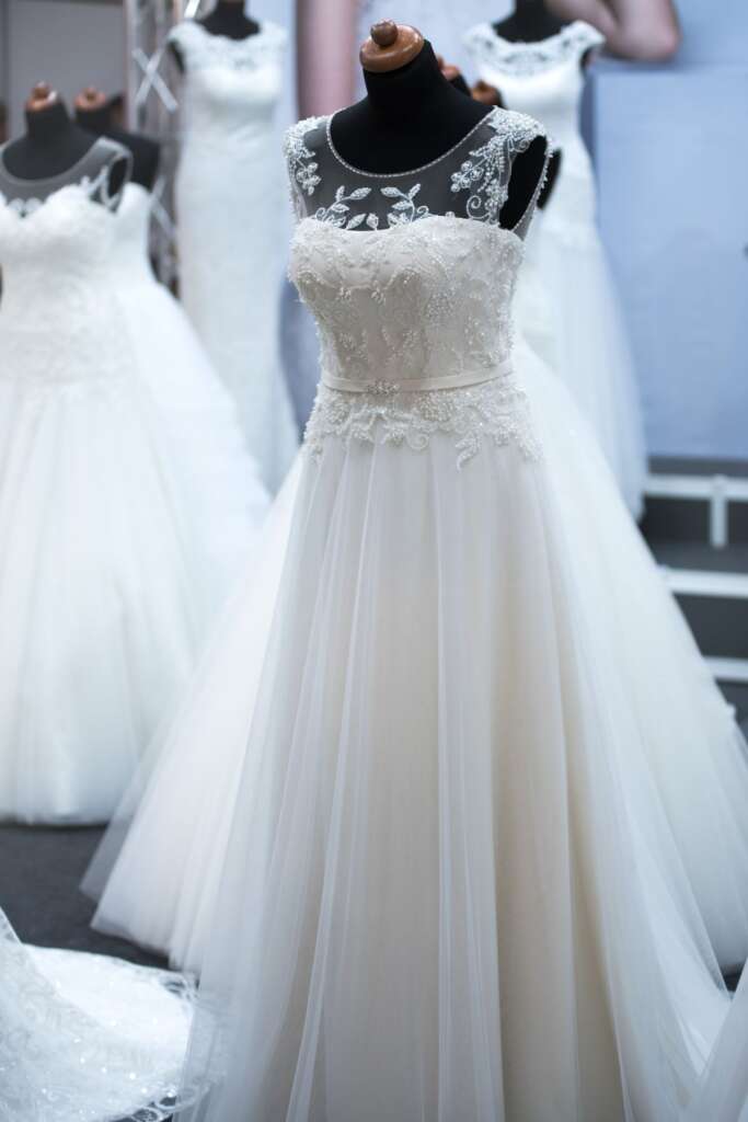 Wedding dress displayed at a bridal expo
