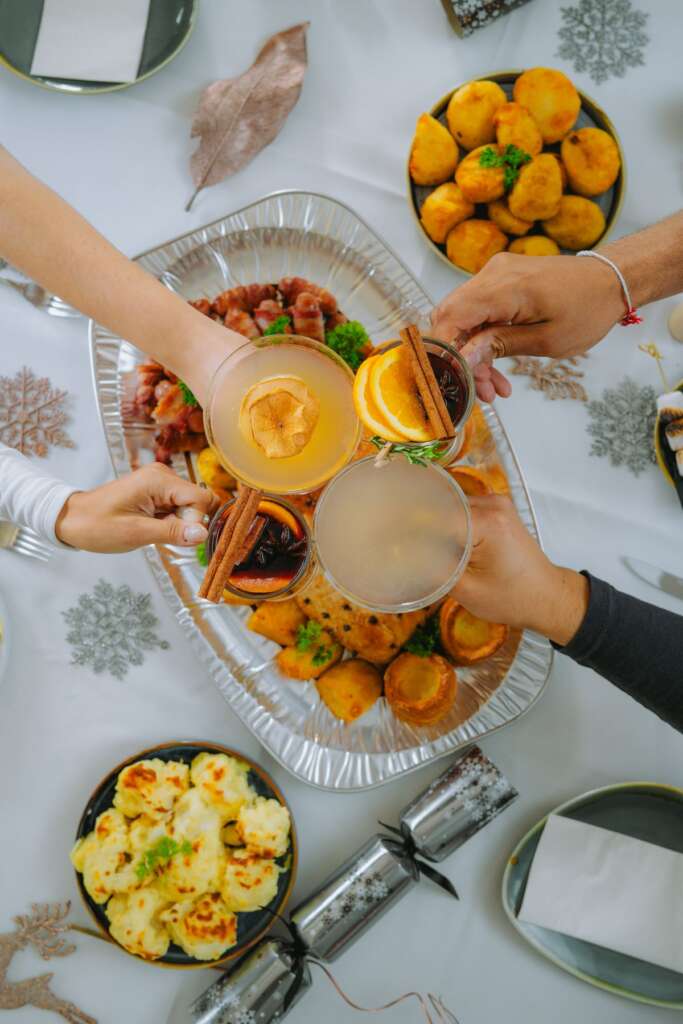 Warm cups of ponche shared at a posada